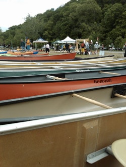 A line of Canoes at the 2010 Alpine Shop's Demo Days